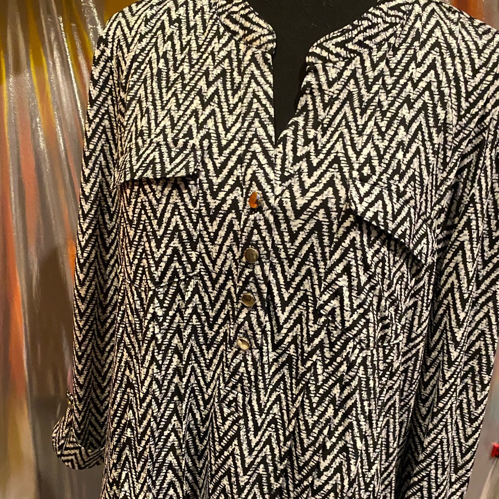 Ladies cute flare top! Black and white abstract design!